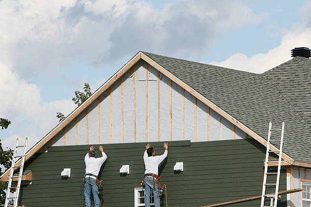 Professional Emergency Siding Repair technician working in South Boston, MA